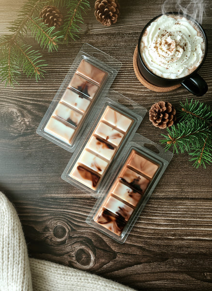 Packaged wax melts on a wooden surface