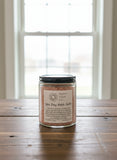 Jar of 'Spa Day Bath Salts' from Pretty Soap Co on a wooden surface