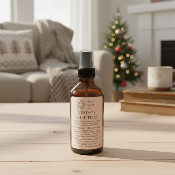 Vintage Christmas scented room spray bottle on a wooden surface
